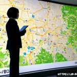 정책분석사와 데이터 활용 기반 정책 연구 - Photorealistic policy analyst in a contemporary Tokyo government research office, examining a large ...